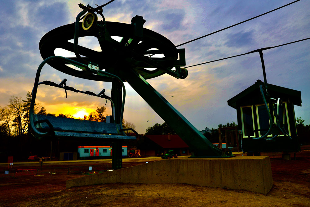 colour photo image of ski hill chair lift machine at earl bales park in toronto, ontario, canada